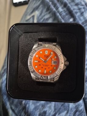 Swiss Army Stainless Steel Watch with Bright Orange Dial